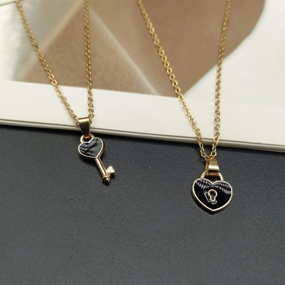 *CARYS* 2-Pc Gold x Black Heart Lock & Key Fashion Necklace Set